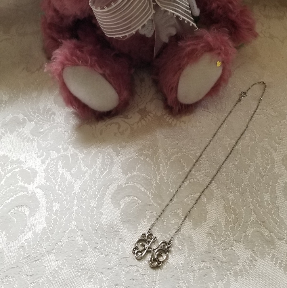 Silver Scroll Letter K necklace.